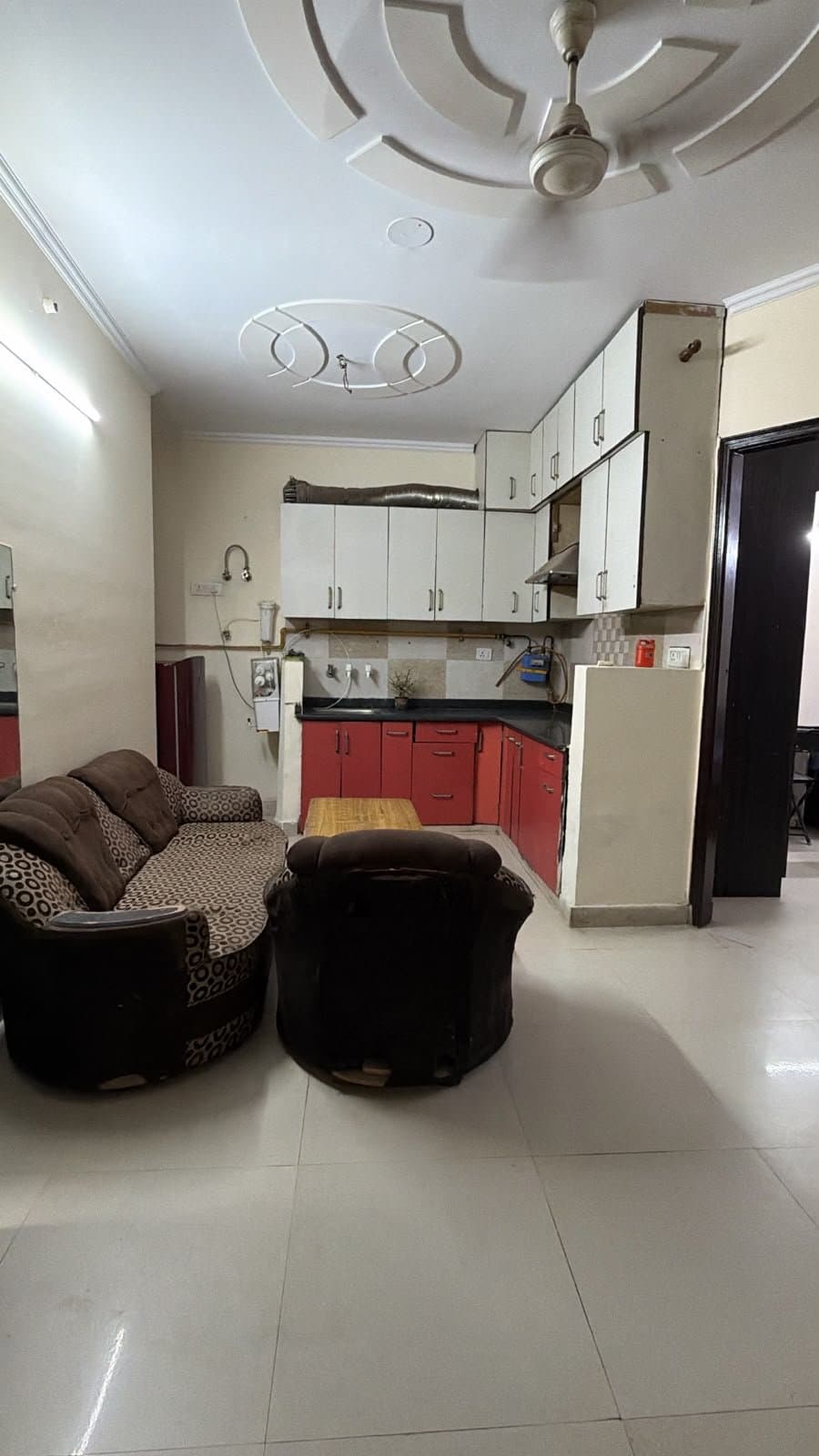 Common area and kitchen at Manvi Home Stay PG where meals are served